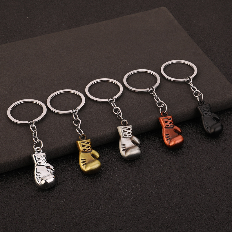 قطعة واحدة من قلادة رياضية إبد - مراجعة Boxing Glove Set وسعره